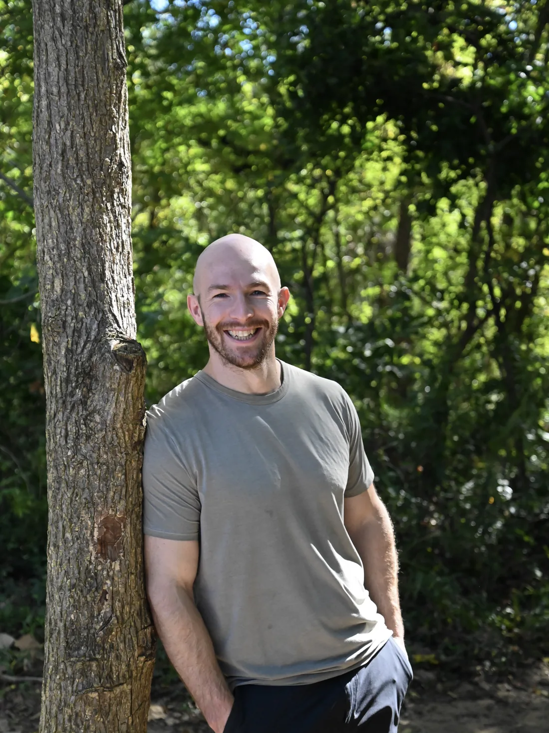 Devin Byrne, LPC, on a wooded trail along the James River