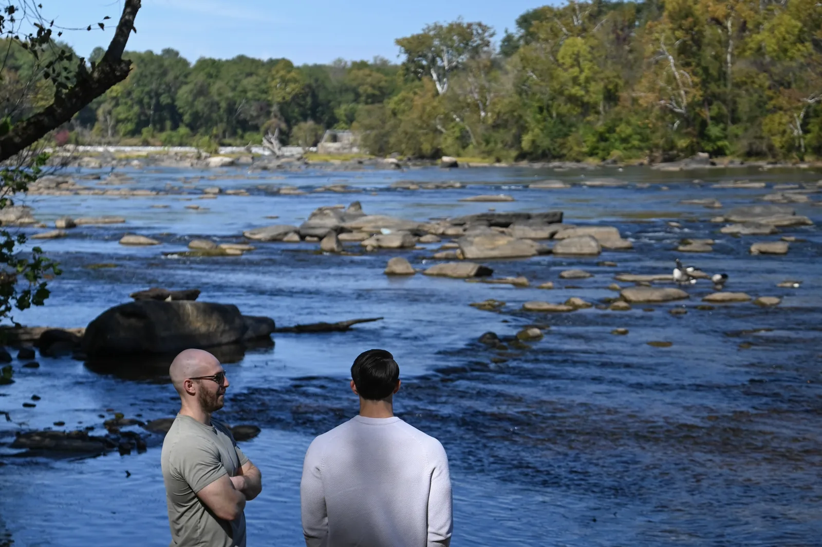 The James River running past the rocks on a clear day