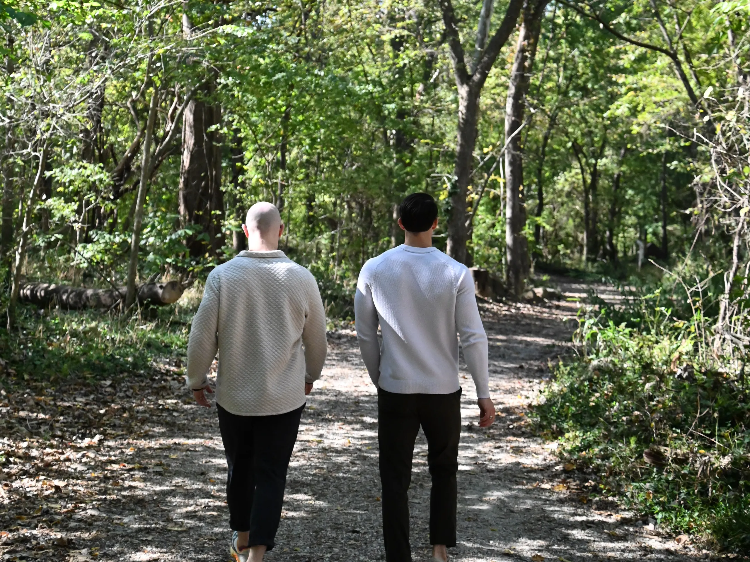 Devin Byrne on a walk-and-talk along a wooded James River trail